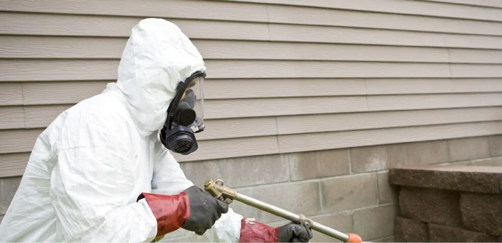 Melbourne Pest control technician doing a spray